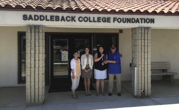 JOHN K WITH "SADDLEBACK DONOR OF THE YEAR AWARD ALONG WITH SCHOLARSHIP  STAFF"